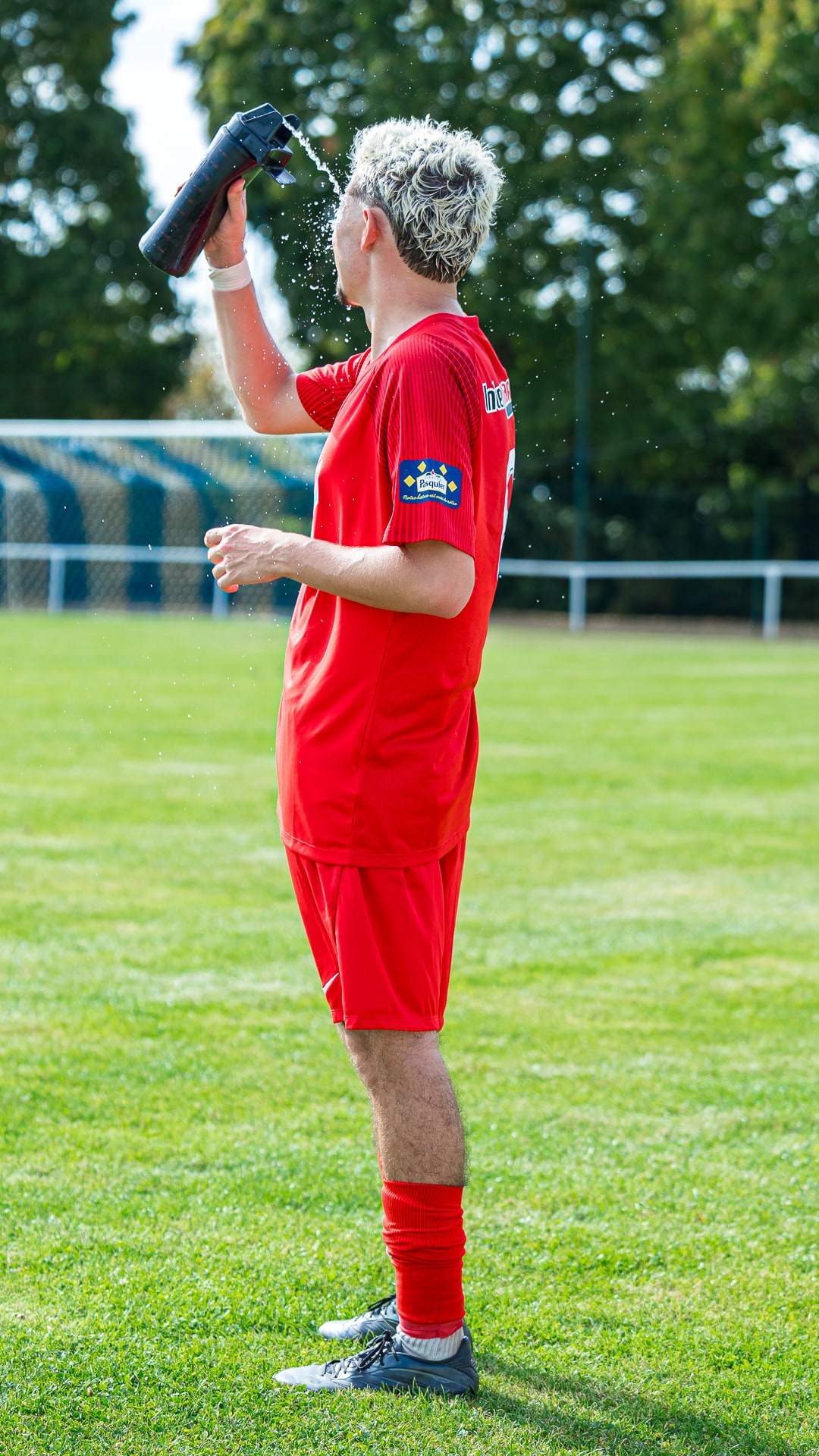 Échauffement d'avant-match, maillot rouge